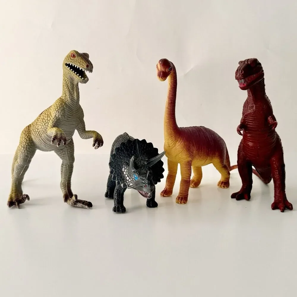 Lot of 4 Vintage Assorted Dinosaurs Plastic/Rubber Embossed - Up to 8.5